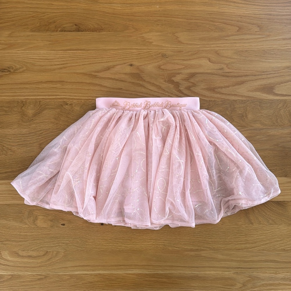 Disney Parks Bibbidi Bobbidi Boutique pink sequin girl’s skirt.